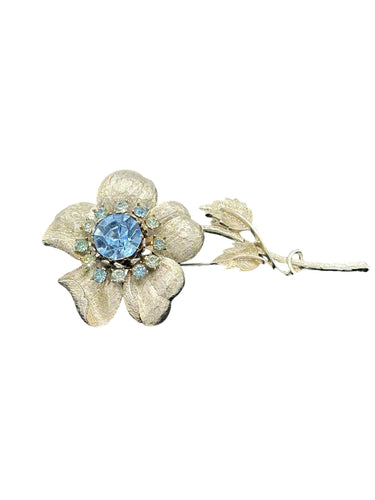 VINTAGE 1950S CORO SILVER FLOWER BROOCH WITH LIGHT BLUE RHINESTONES, SILVER TONE SETTING, BROOCHES AND PINS - Finely Find It Vintage!